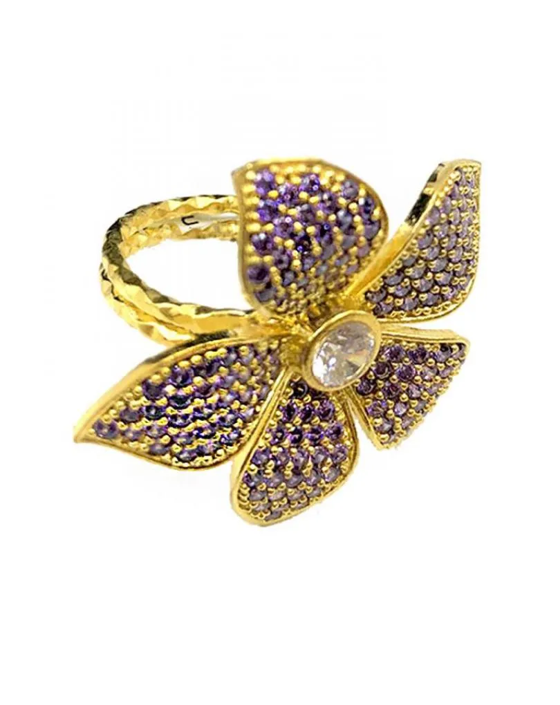 ANILLOS GRANDES MORADOS CON VISTOSA FLOR DE PEDRERIA JOYA