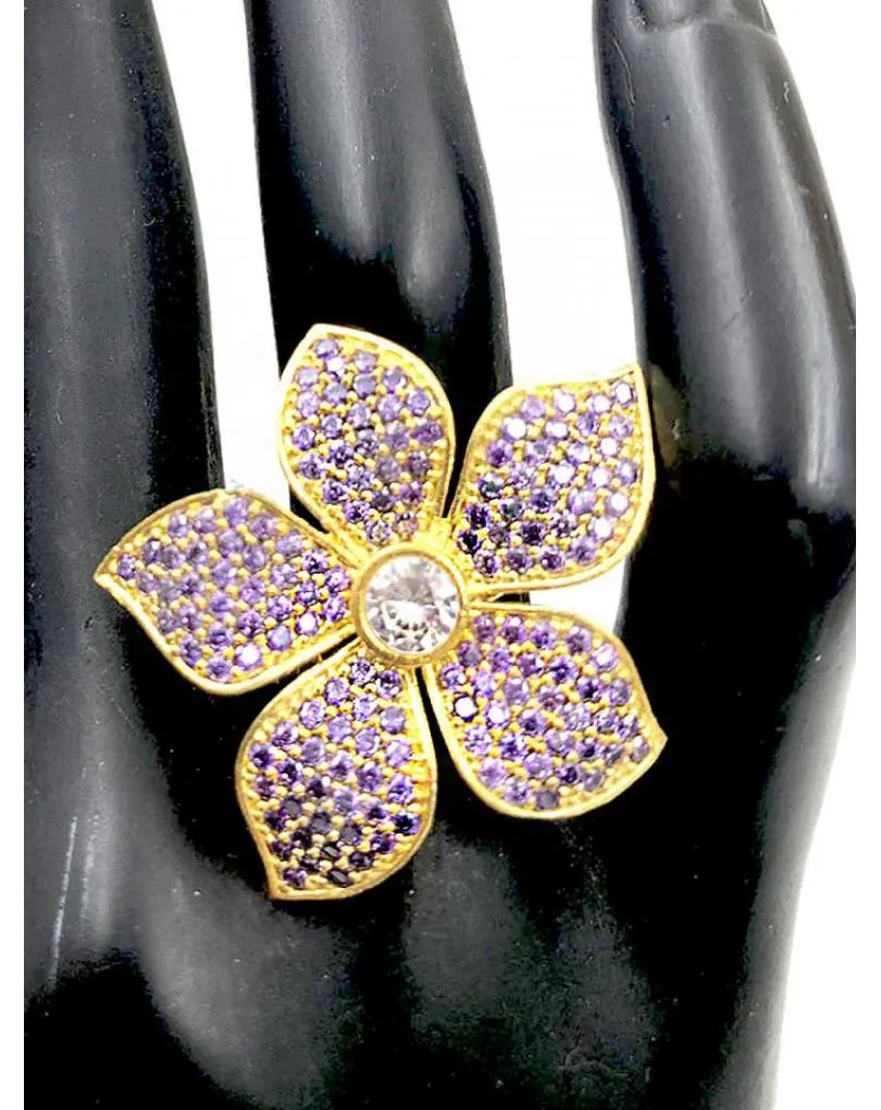 ANILLOS GRANDES MORADOS CON VISTOSA FLOR DE PEDRERIA JOYA
